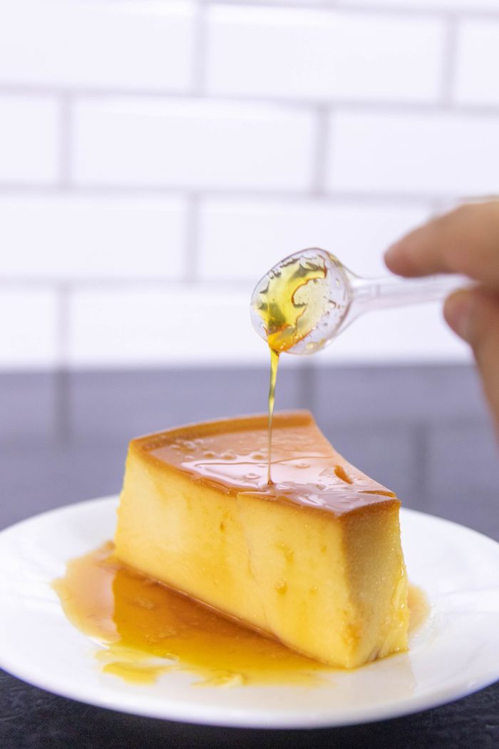 The Art of Drawing Readers In: Your attractive post title goes here Slice of cheesecake drizzled with honey on a white plate. Perfect dessert image showcasing sweet indulgence.
